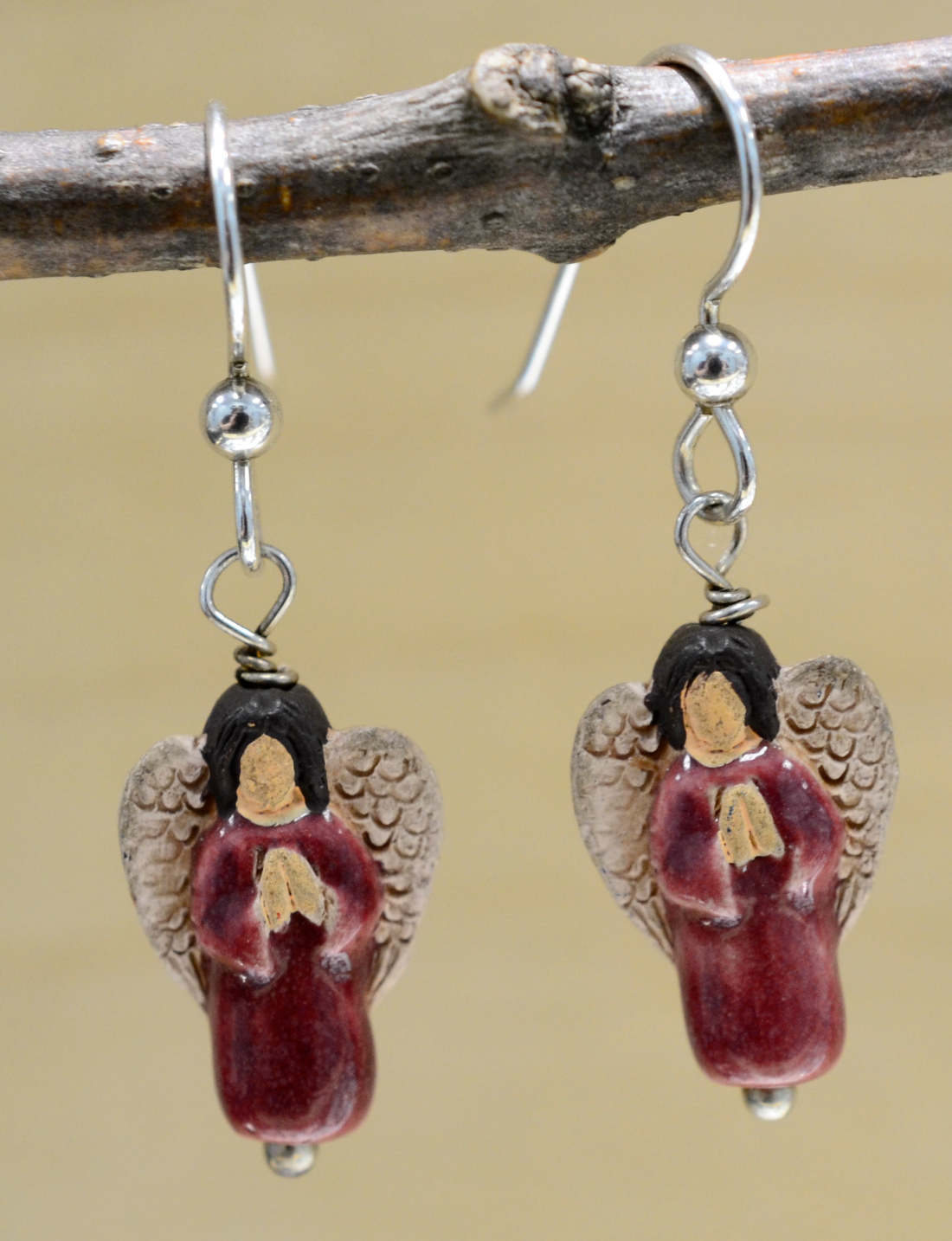 handmade red ceramic angel earrings