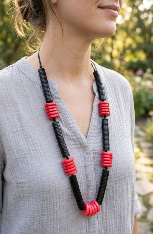 pink to red ombre fade recycled button necklace on woman