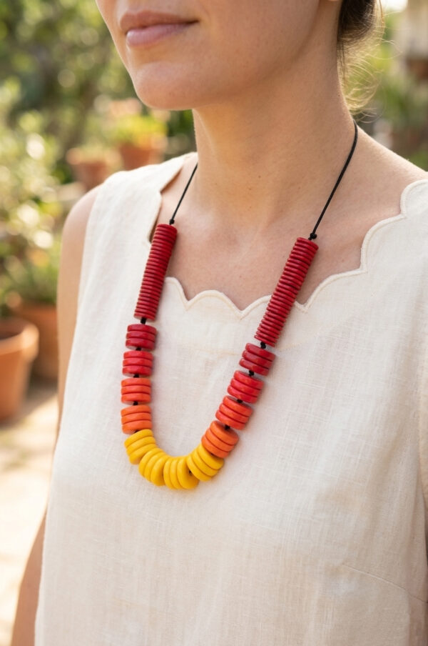 repurposed ombre fade red to yellow button necklace on woman