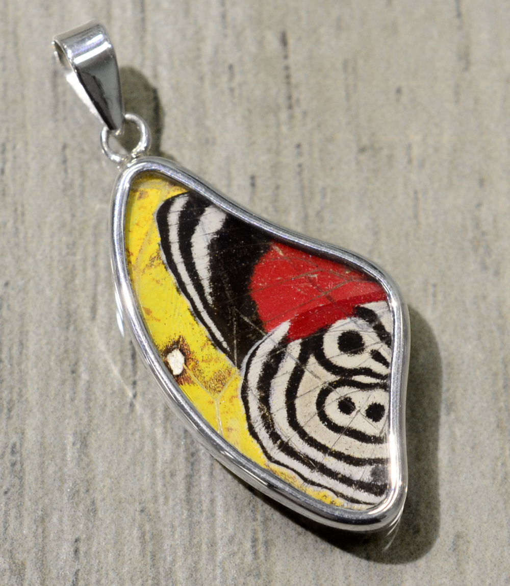 red yellow black and white butterfly wing wing shaped pendant
