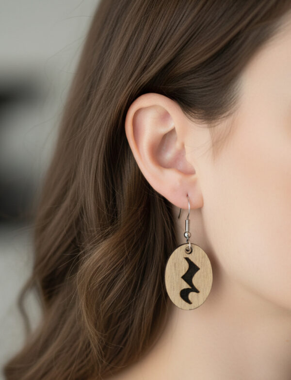 wooden quarter rest earrings on model
