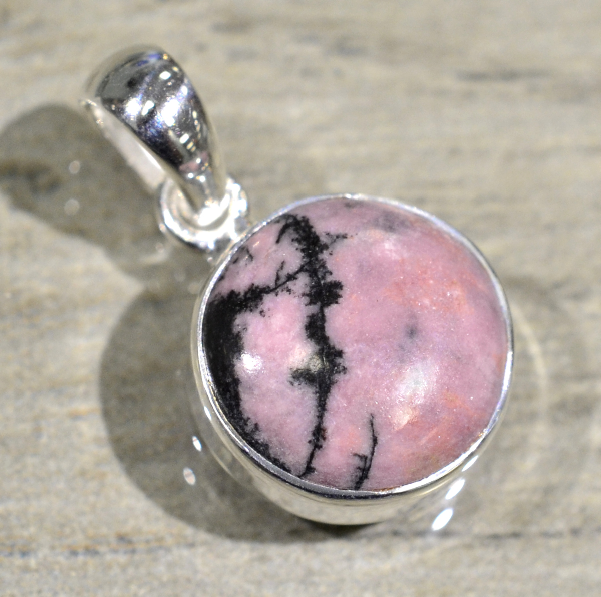 pink rhodonite circle shaped pendant