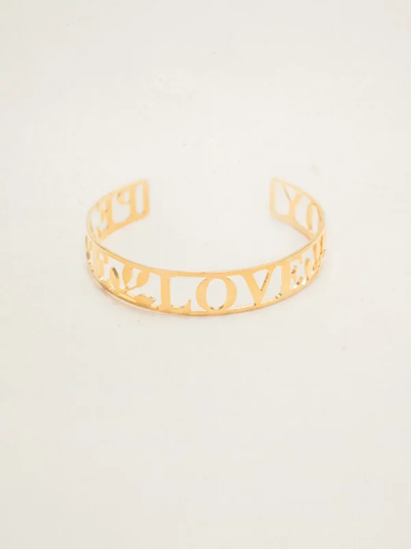 peace, love, and joy goldtone cuff bracelet by jewelry designer Holly Yashi