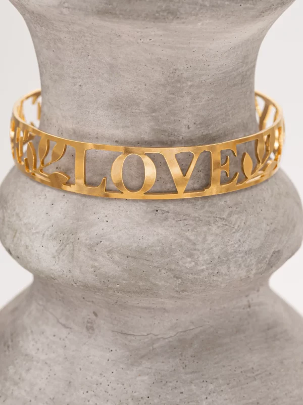 peace, love, and joy goldtone cuff bracelet by jewelry designer Holly Yashi