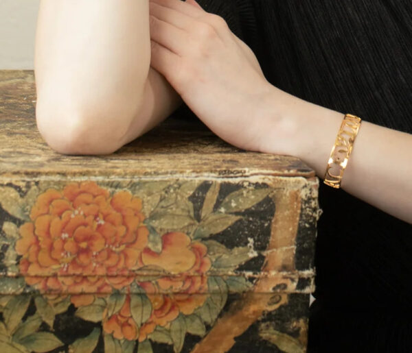 peace, love, and joy goldtone cuff bracelet by jewelry designer Holly Yashi