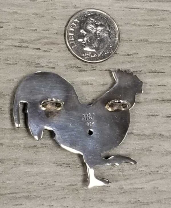 back of rooster pendant
