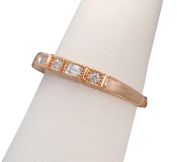 side view of diamond and rose gold ring