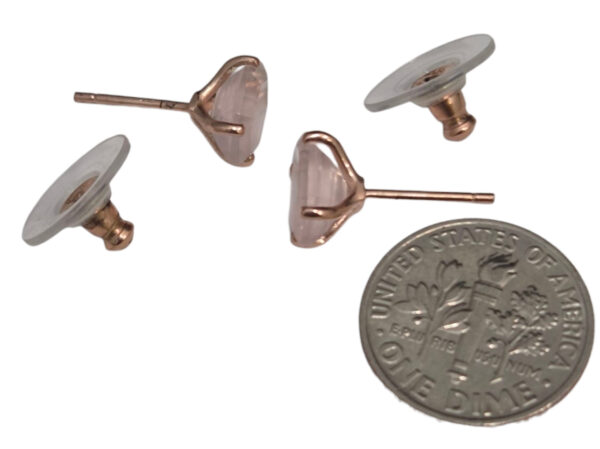 rose quartz stud earrings with dime for size comparison