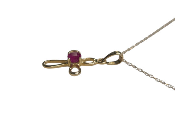 side view of ruby cross necklace
