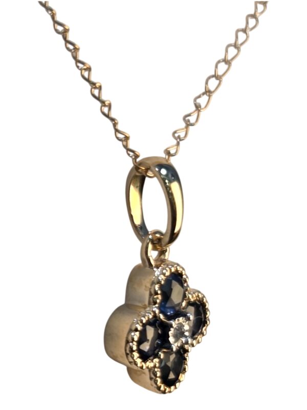 side view of sapphire and diamond necklace