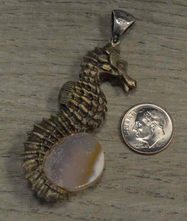 Back of pink druzy and seahorse pendant