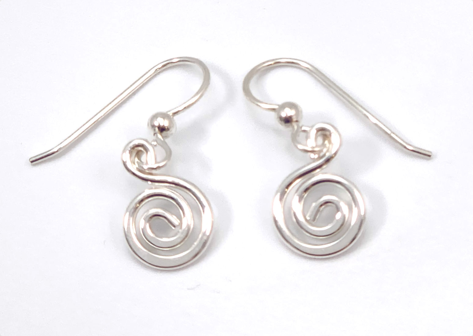 Spiral sterling silver handmade earrings by Ted Walker