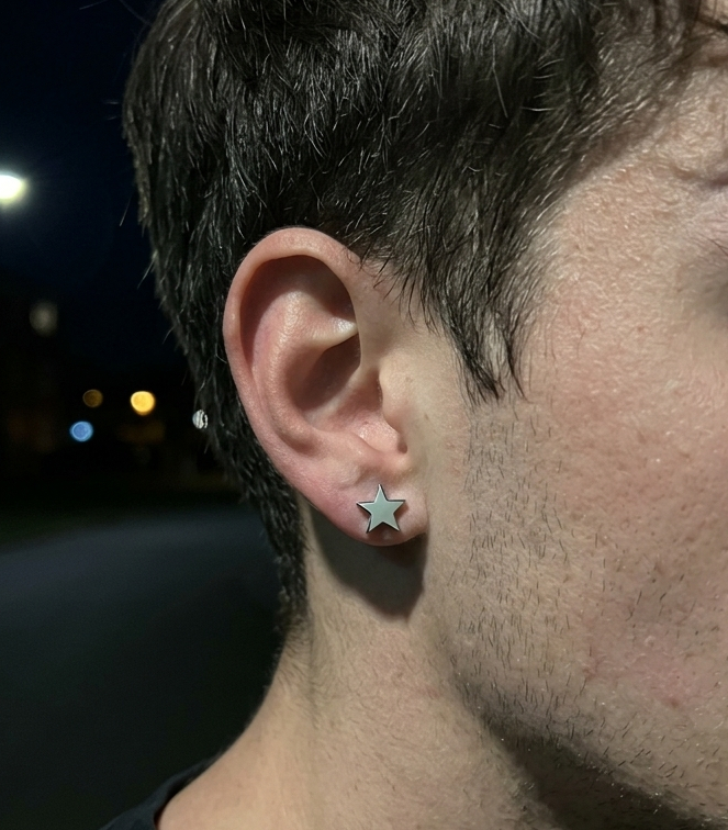stainless steel star stud earrings on model