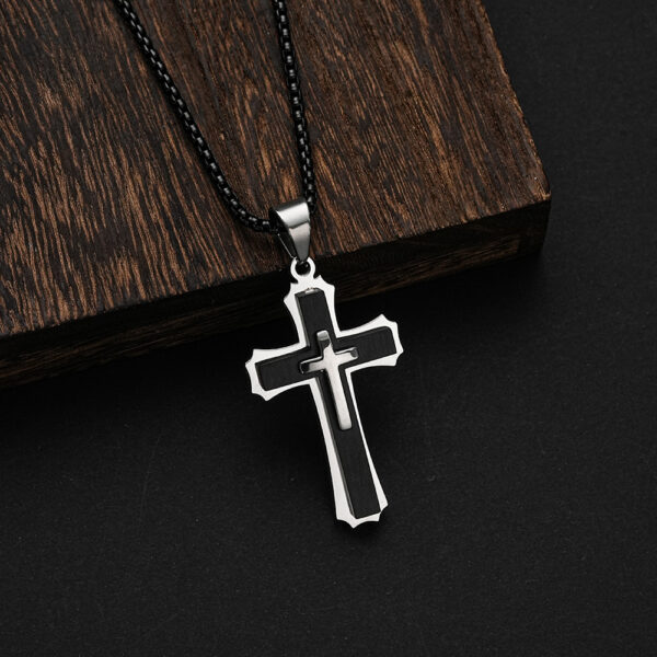 black and steel cross pendant