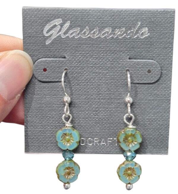 Czech glass teal flower earrings on earring card