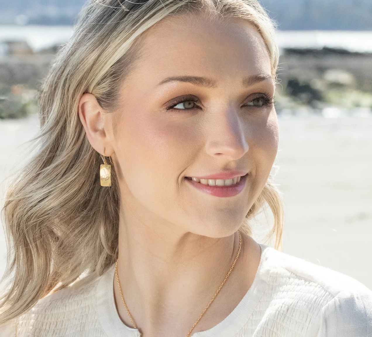 textured rectangle earrings by Holly Yashi on model