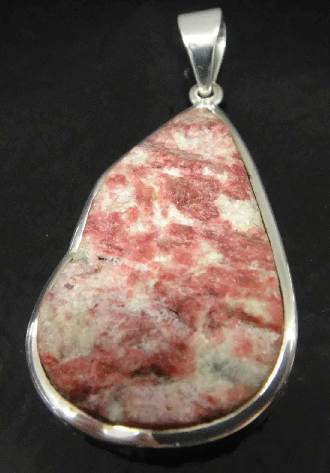 Rough thulite and sterling silver pendant