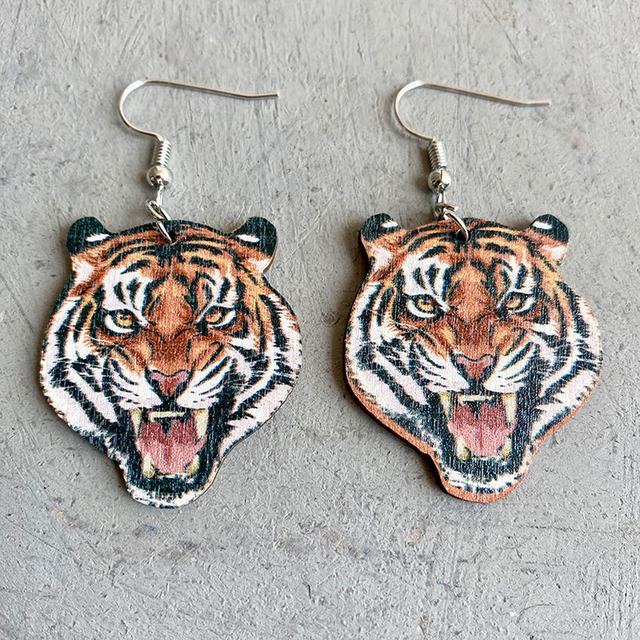 Tiger earrings made from wood and stainless steel Jewelry by Glassando