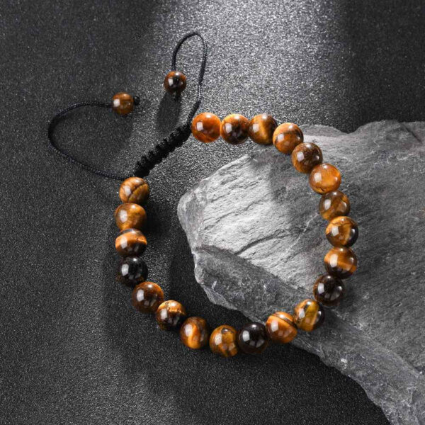 tiger's eye adjustable bracelet on stone