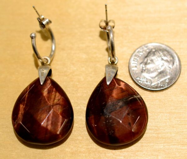 back of red cherry tigers eye drop earrings with dime
