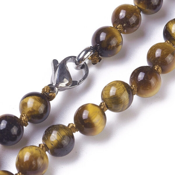close up of tiger's eye necklace showing stainless steel clasp