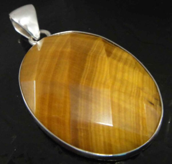 Handmade faceted oval tiger's eye and .950 sterling silver pendant