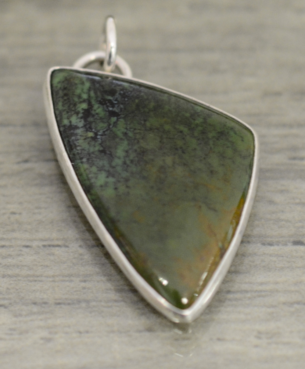 handmade triangular green and brown turquoise pendant by Dale Repp