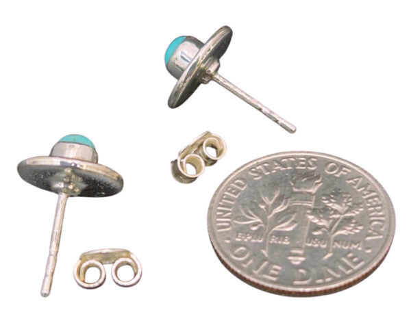 back of turquoise and sterling silver stud earrings with dime for size comparison