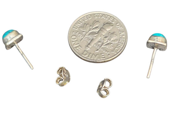 back of turquoise studs with dime for size comparison