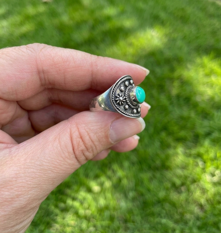 side view of turquoise and sterling silver ring