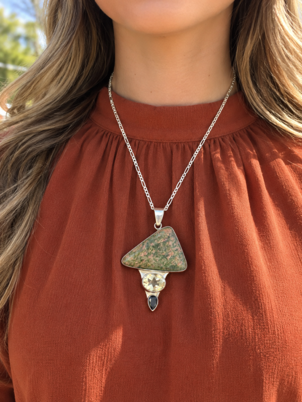 unakite, citrine, and garnet necklace on model
