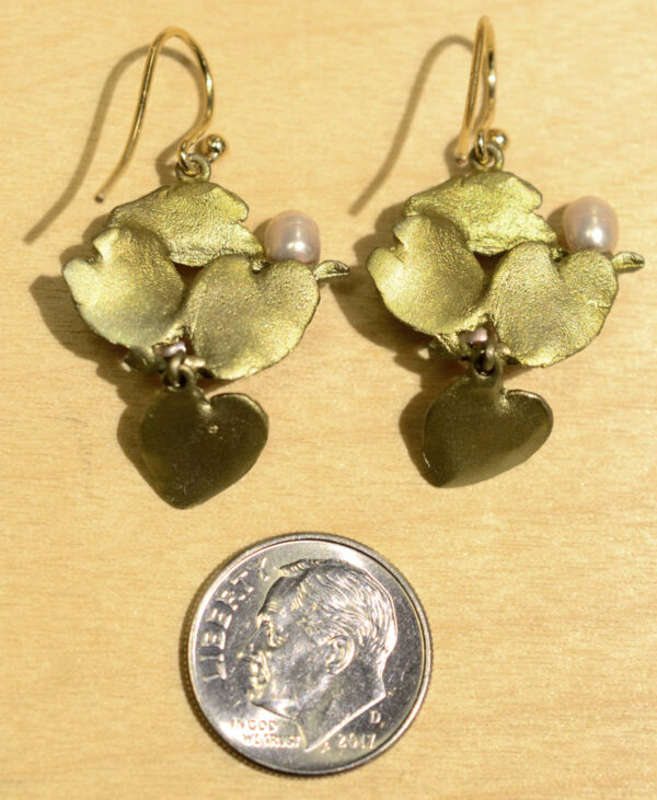 Back of Michael Michaud Water Lily dangle earrings, shown with dime (not included) for scale