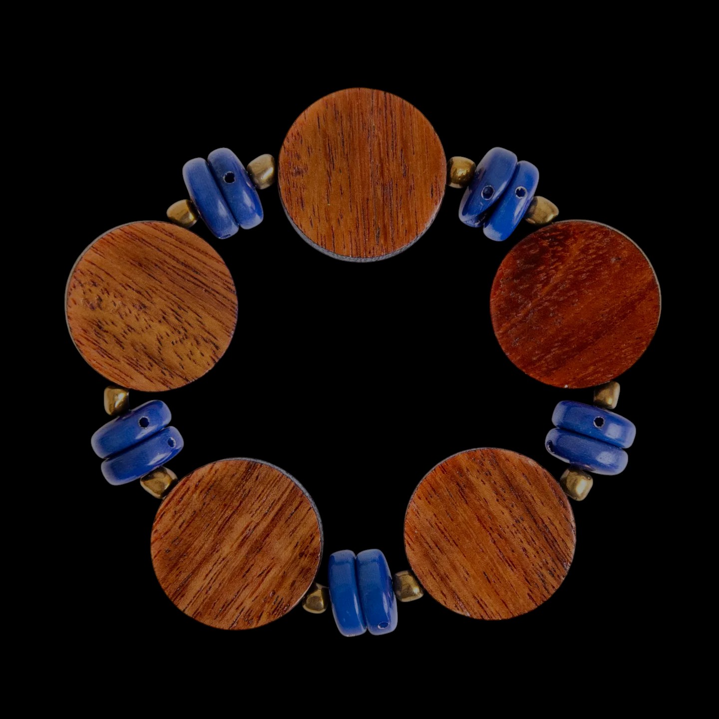 dark blue tagua nut and wood bracelet on black background
