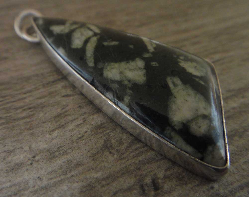 writing stone and sterling silver pendant by Dale Repp