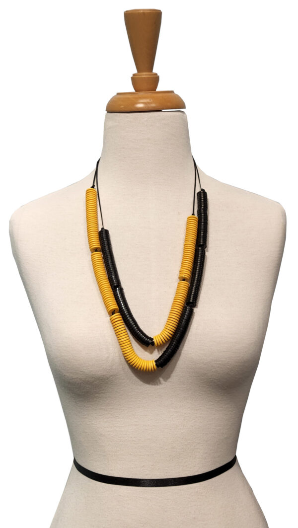 two-tone necklace on mannequin