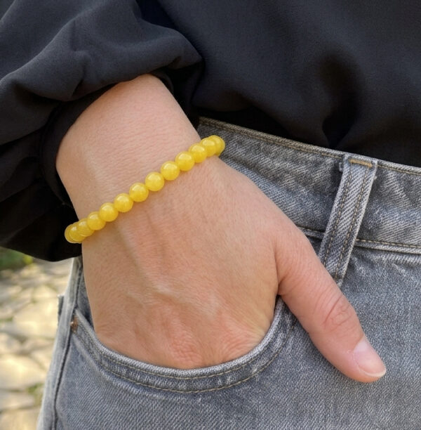 yellow jade bracelet on model