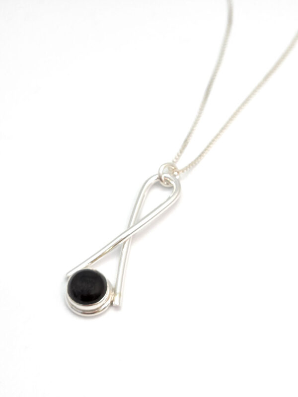 Black onyx and sterling silver pendant on chain